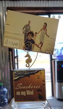 Load image into Gallery viewer, Photo Block Clip with Seahorse Charm & "Seashores on my mind" Wood Grain