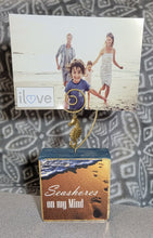 Load image into Gallery viewer, Photo Block Clip with Seahorse Charm &amp; "Seashores on my mind" Wood Grain
